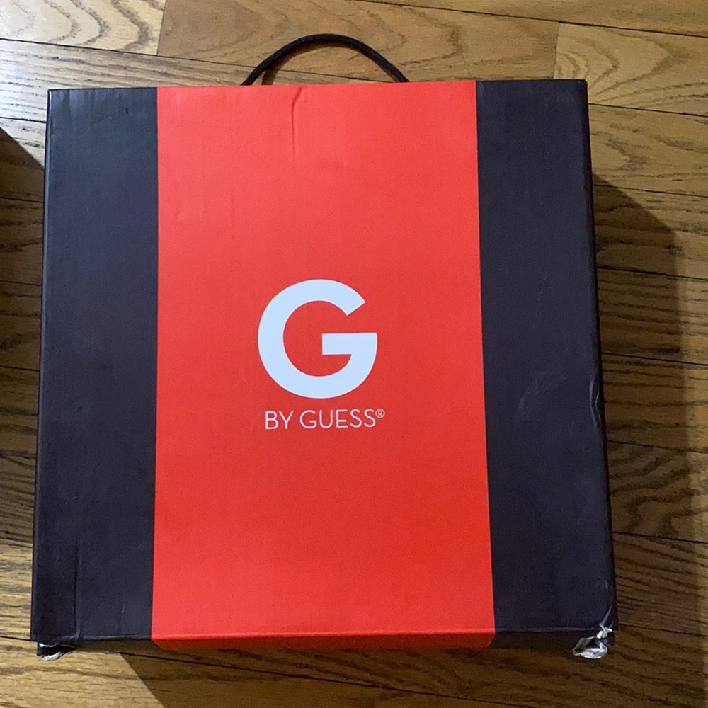 Never been worn camel brown guess boots.